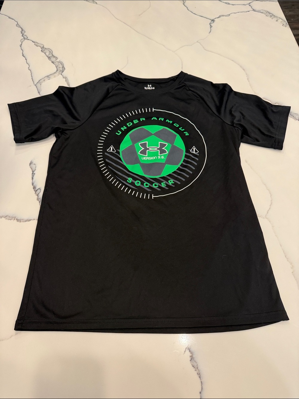 Under Armour boys Black Short-Sleeve Soccer Graphic Tee with Green Accent
